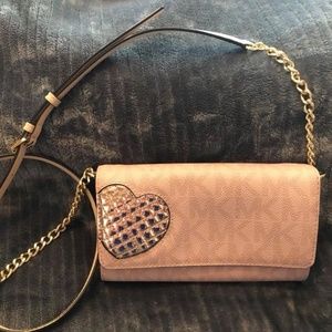 Small light pink Michael Kors wallet mini purse